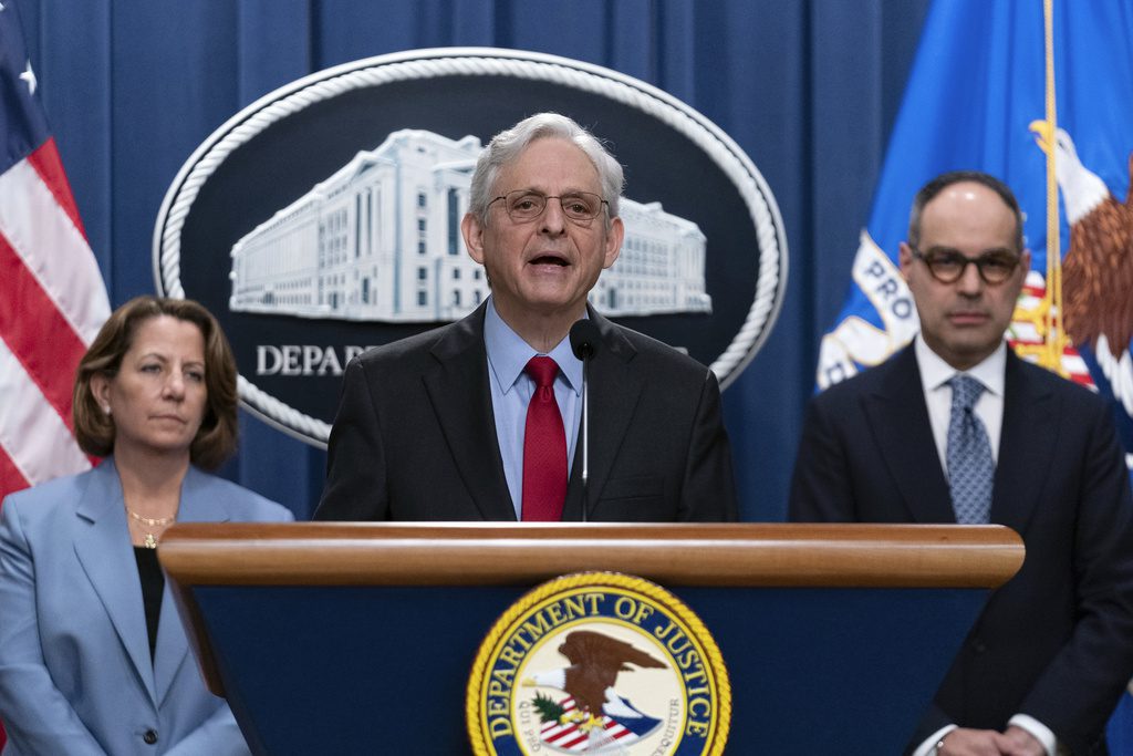 Attorney General Merrick Garland flanked by Deputy Attorney General Lisa Monaco and Assistant Attorney General Jonathan Kanter of the Justice Department's Antitrust Division, speaks during a news conference at the Department of Justice headquarters in Washington, Thursday, May 23, 2024. The Justice Department has filed a sweeping antitrust lawsuit against Ticketmaster and parent company Live Nation Entertainment, accusing them of running an illegal monopoly over live events in America and driving up prices for fans. The lawsuit was filed Thursday in New York and was brought with 30 state and district attorneys general. . (AP Photo/Jose Luis Magana)